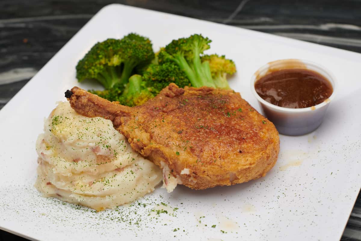 Served with mashed potatoes and broccoli