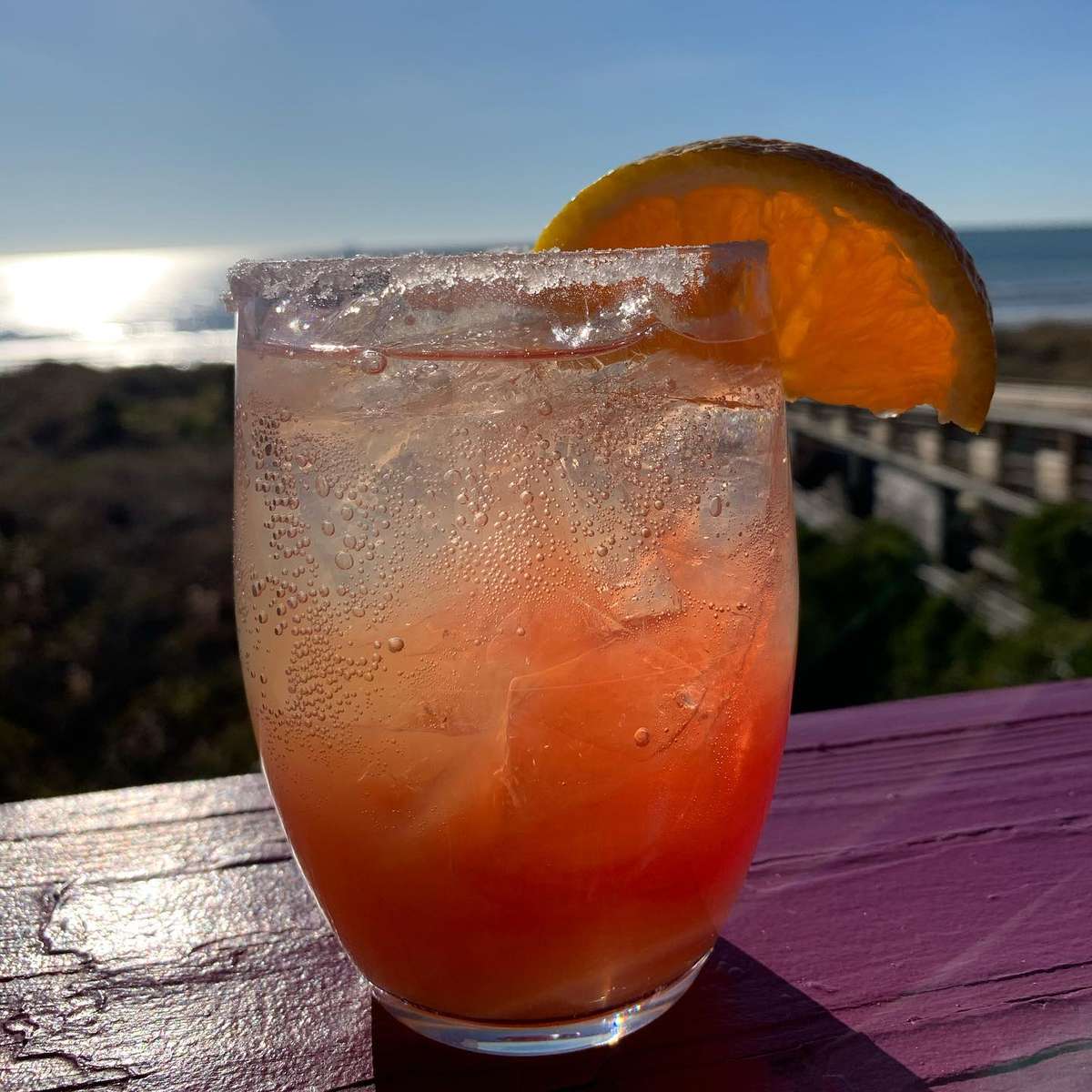 Cocktail on roof top bar ledge