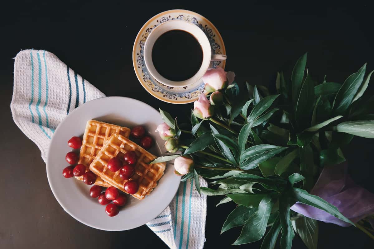 waffles with coffee and plant
