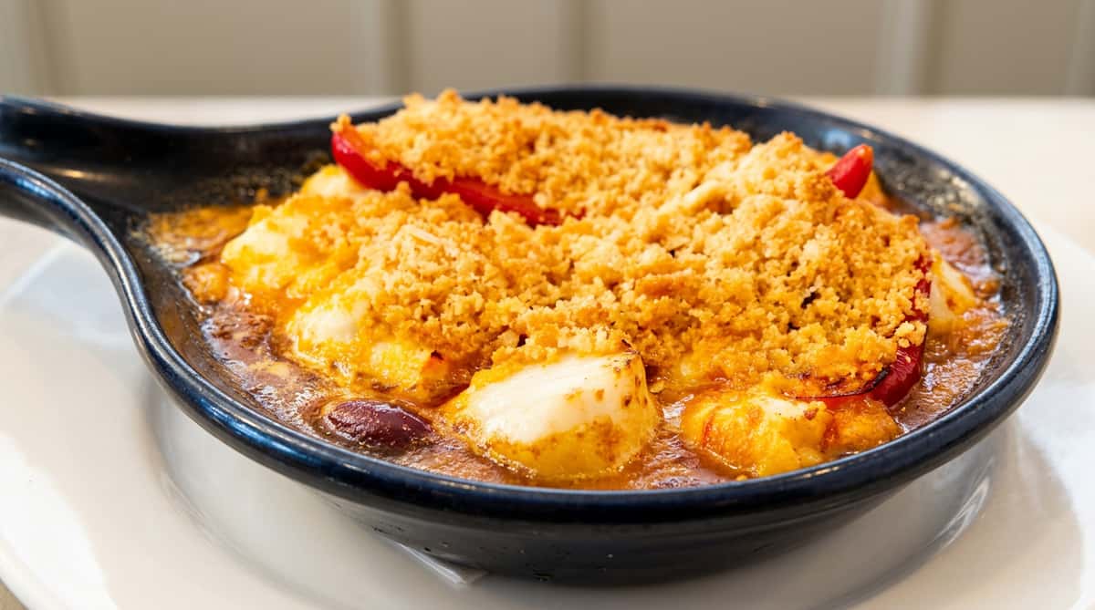 Baked shrimp casserole topped with buttery cracker crumbs at Roger's Family Restaurant in Somerset MA