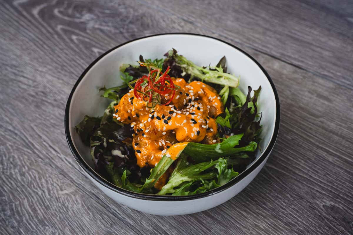 Breaded shrimp in sweet and sour Ebi sauce, served on a bed of mixed greens