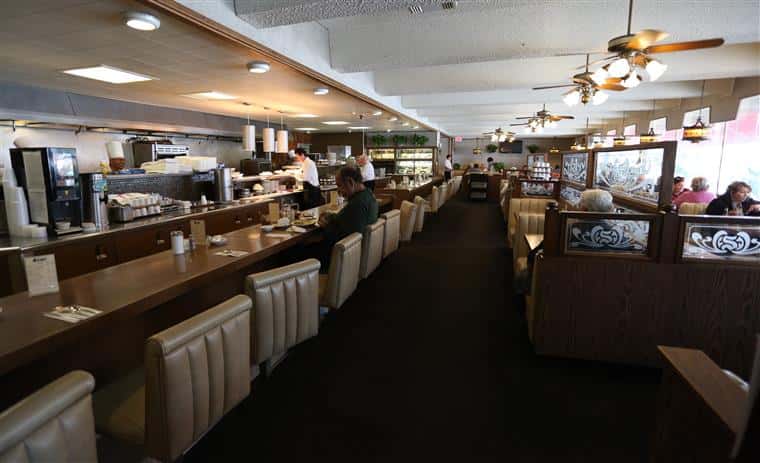 Stox dining room showing dining booths and counter seating