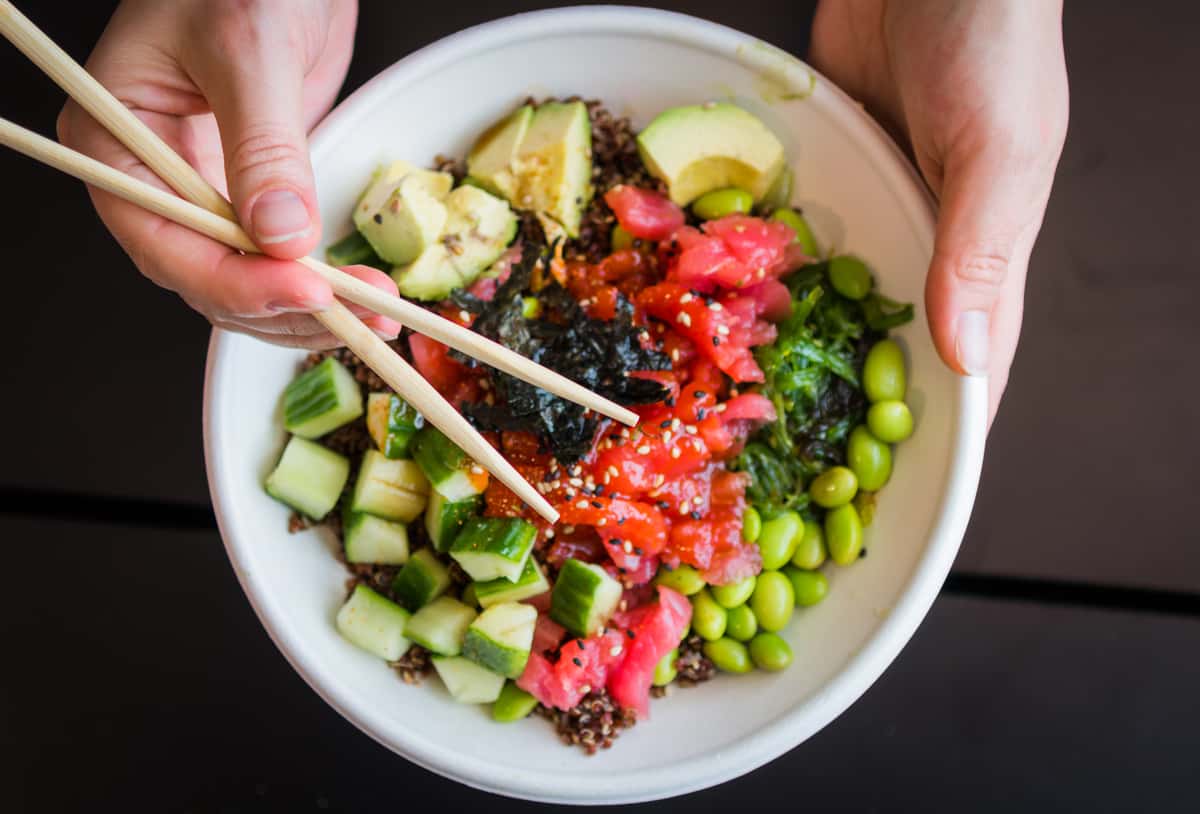 Hand holding salad