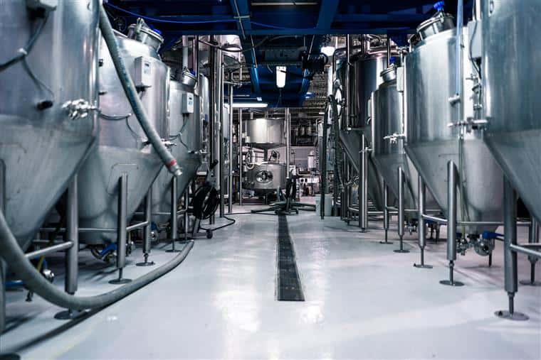 interior of the brewery with view of steel barrels