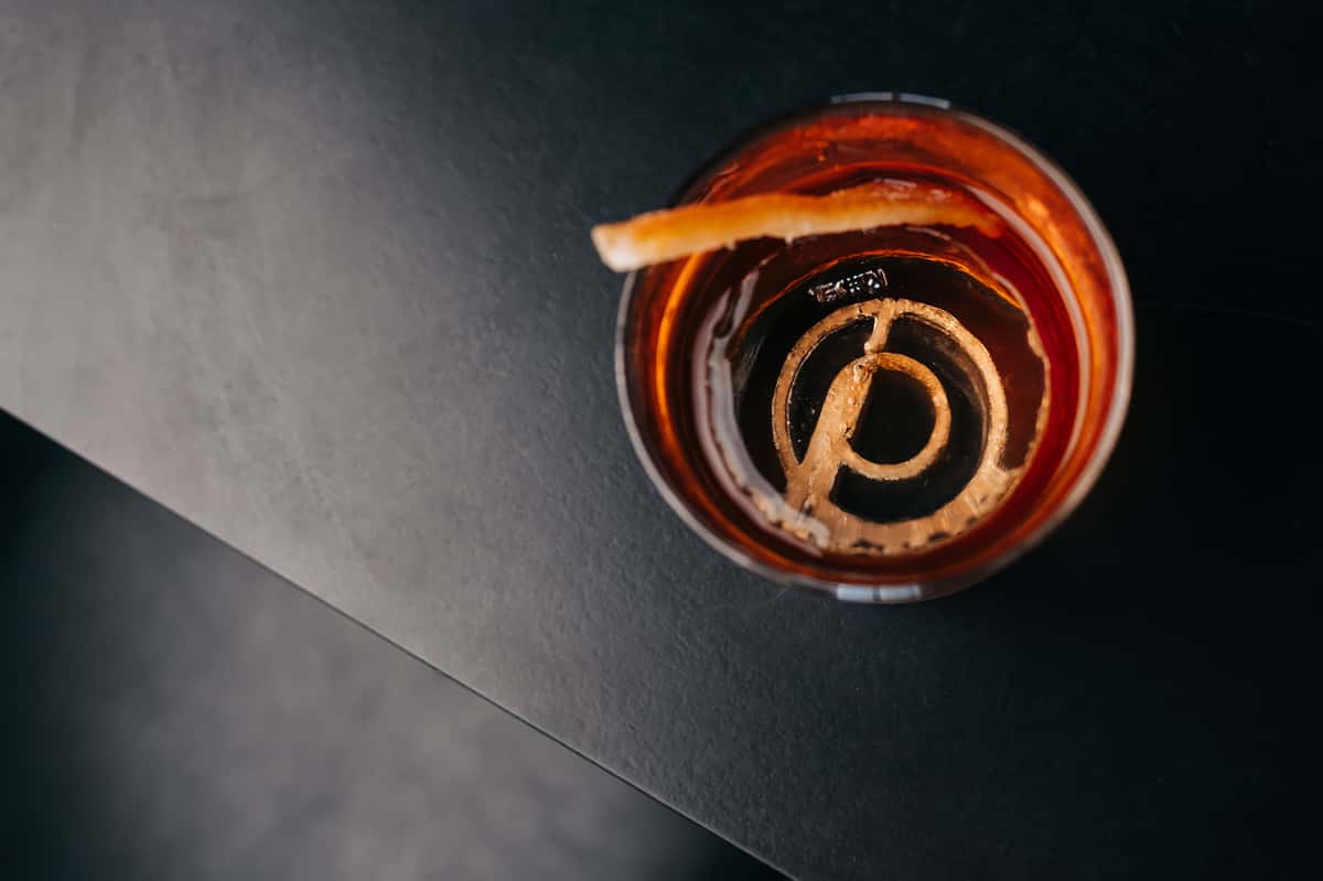 PLate's signature old fashioned
