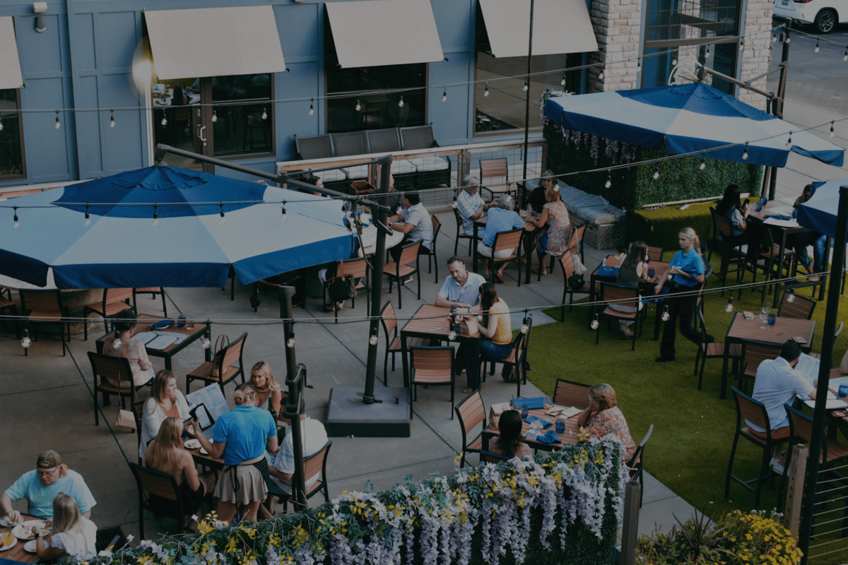 Osteria's full patio features shaded tables, open-air seating, and string lighting—ideal for alfresco brunch, happy hour, or private events. A lively, coastal-inspired atmosphere that transitions beautifully from day to night.