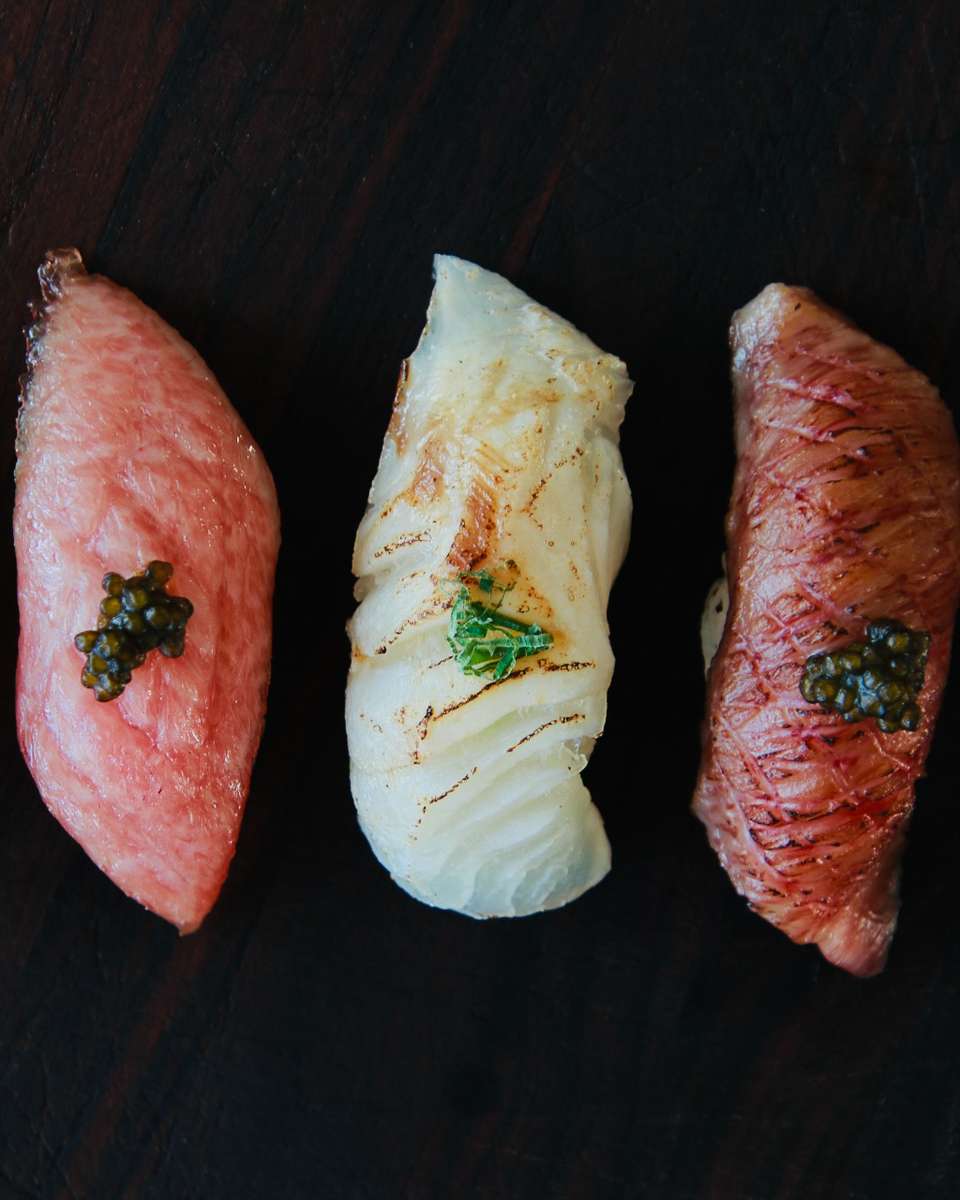 3 sushi on a table