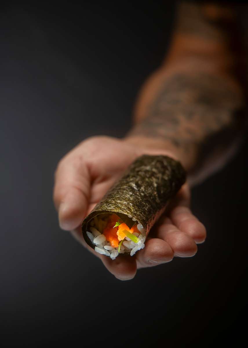 Hand showing a roll