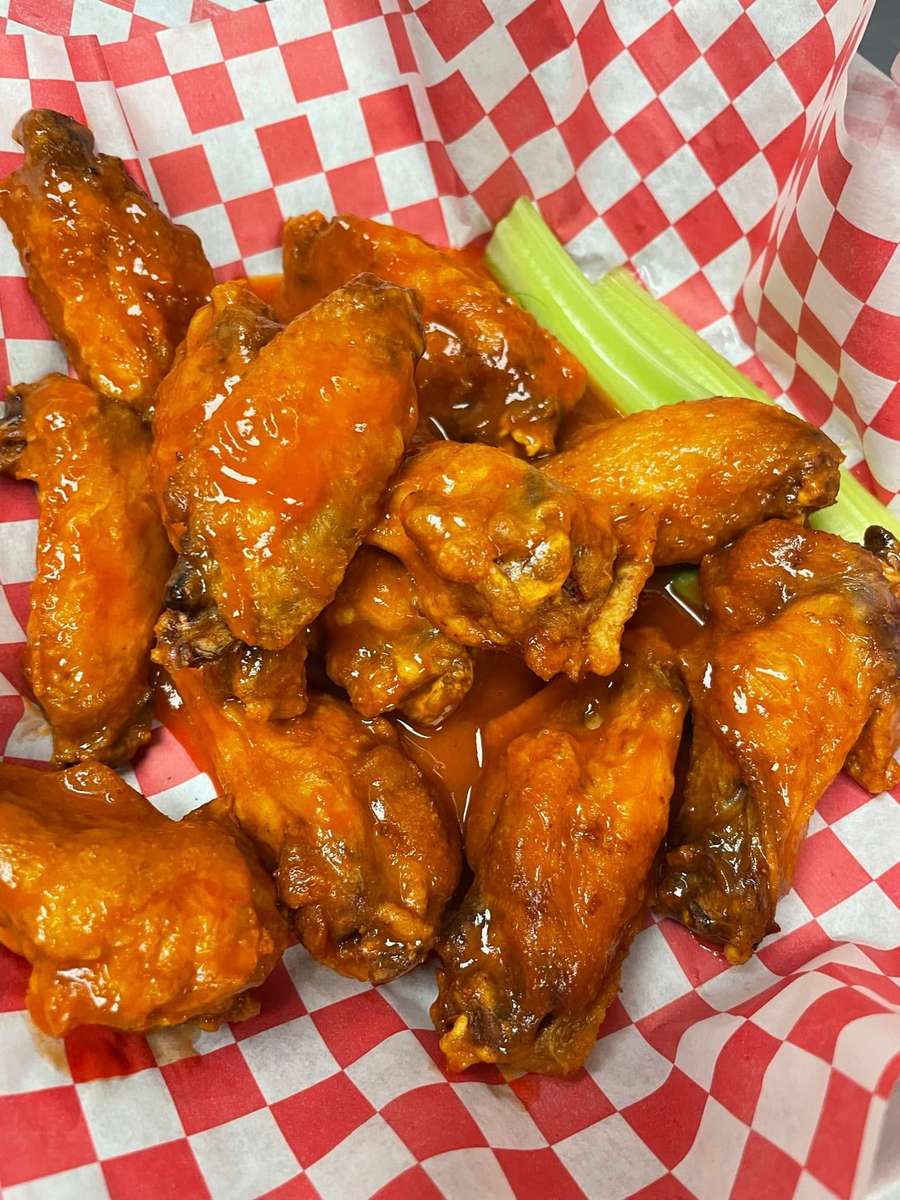 Buffalo wings with sliced celery