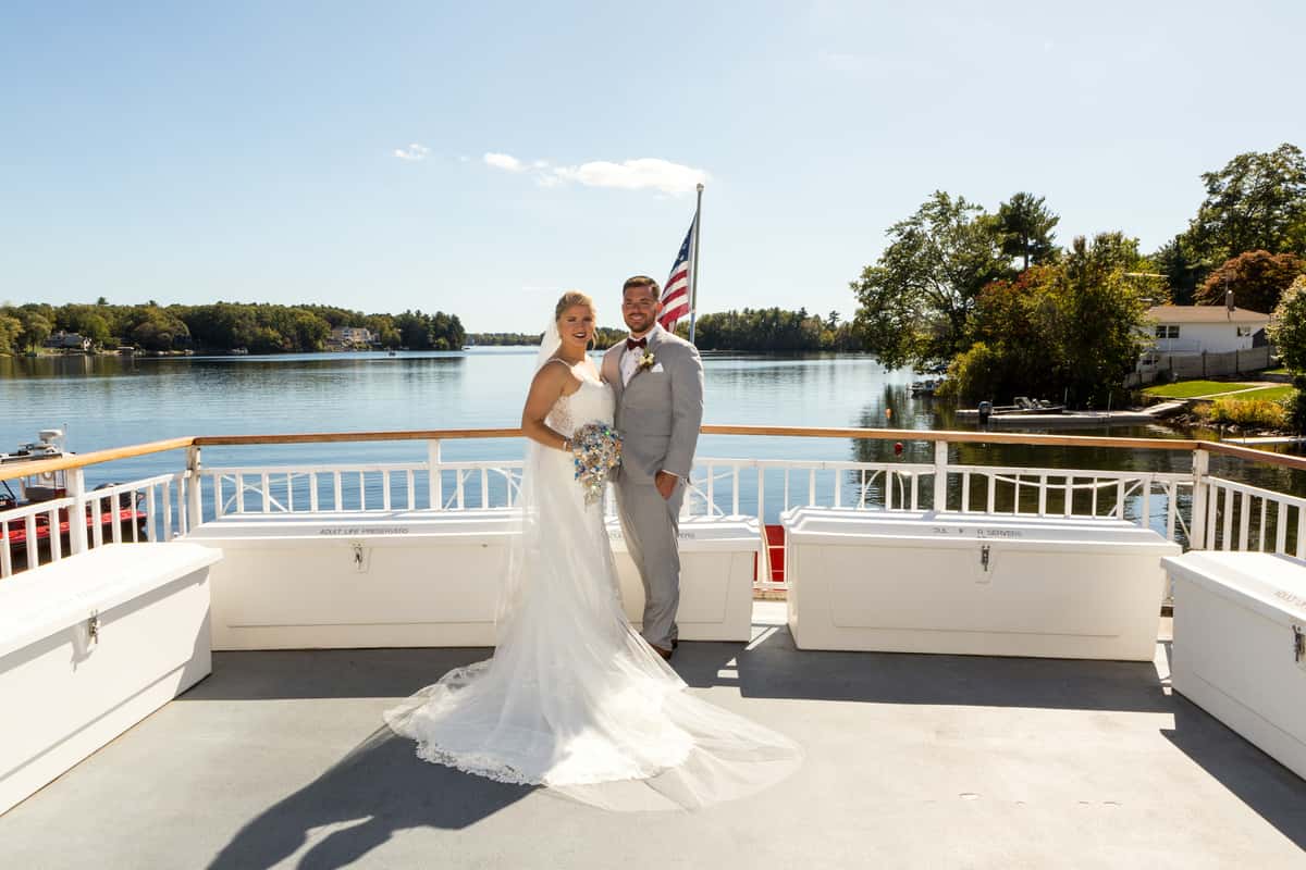 couple posing in boat deck