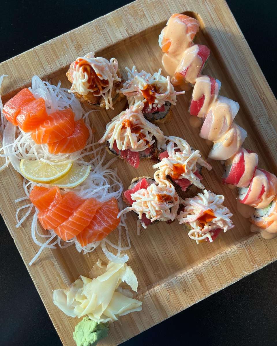 o.m.g roll, sin city roll, and salmon sashimi