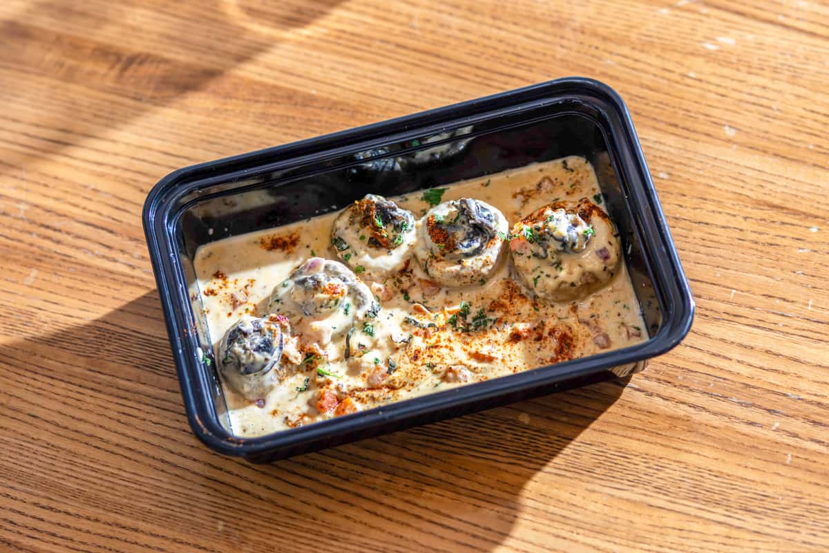 Tender mushroom caps stuffed with Escargot, sautéed in a house-made garlic butter sherry wine sauce.