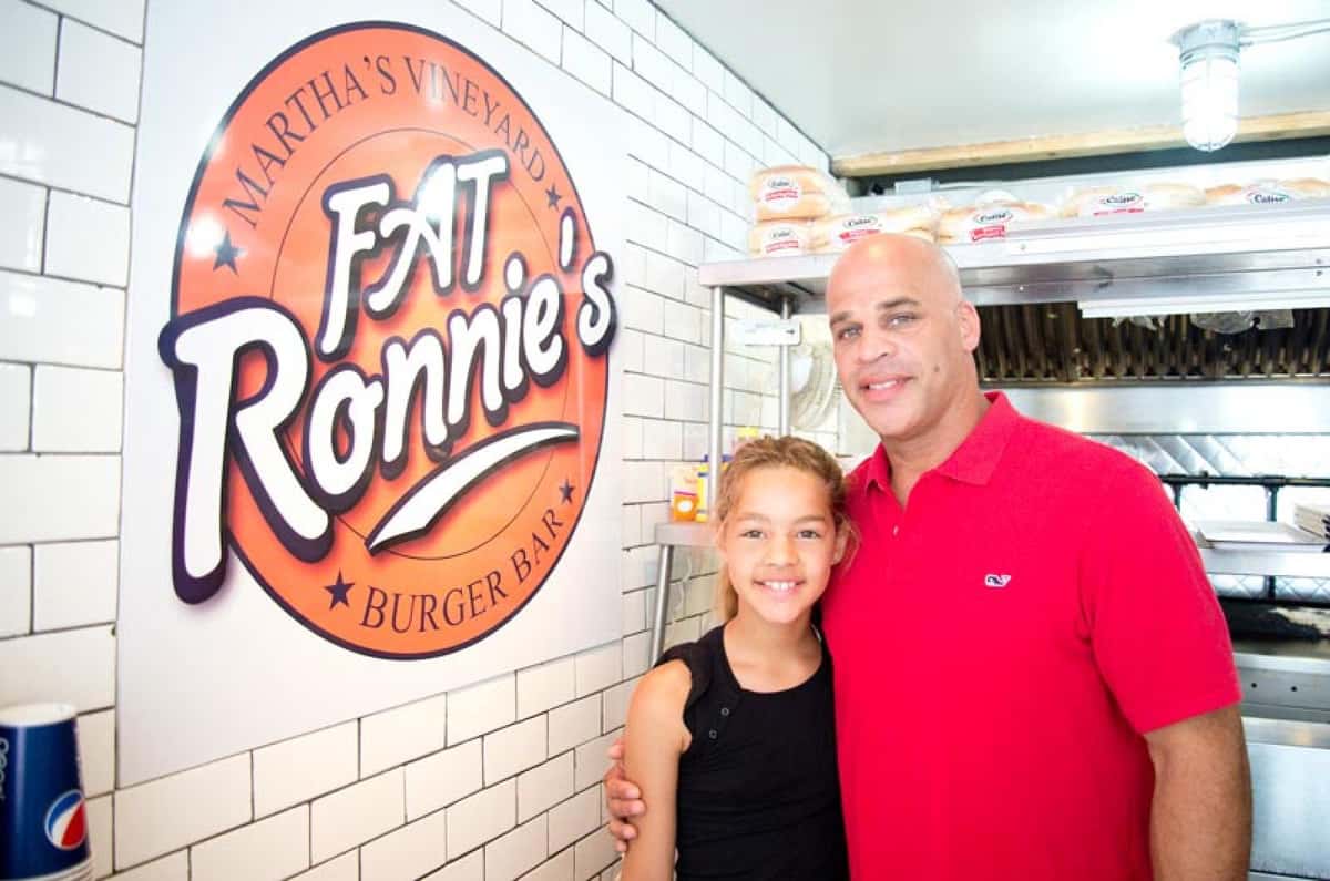 Reynaldo Faust, with daughter Reyna, owner of the new Circuit avenue burger joint.