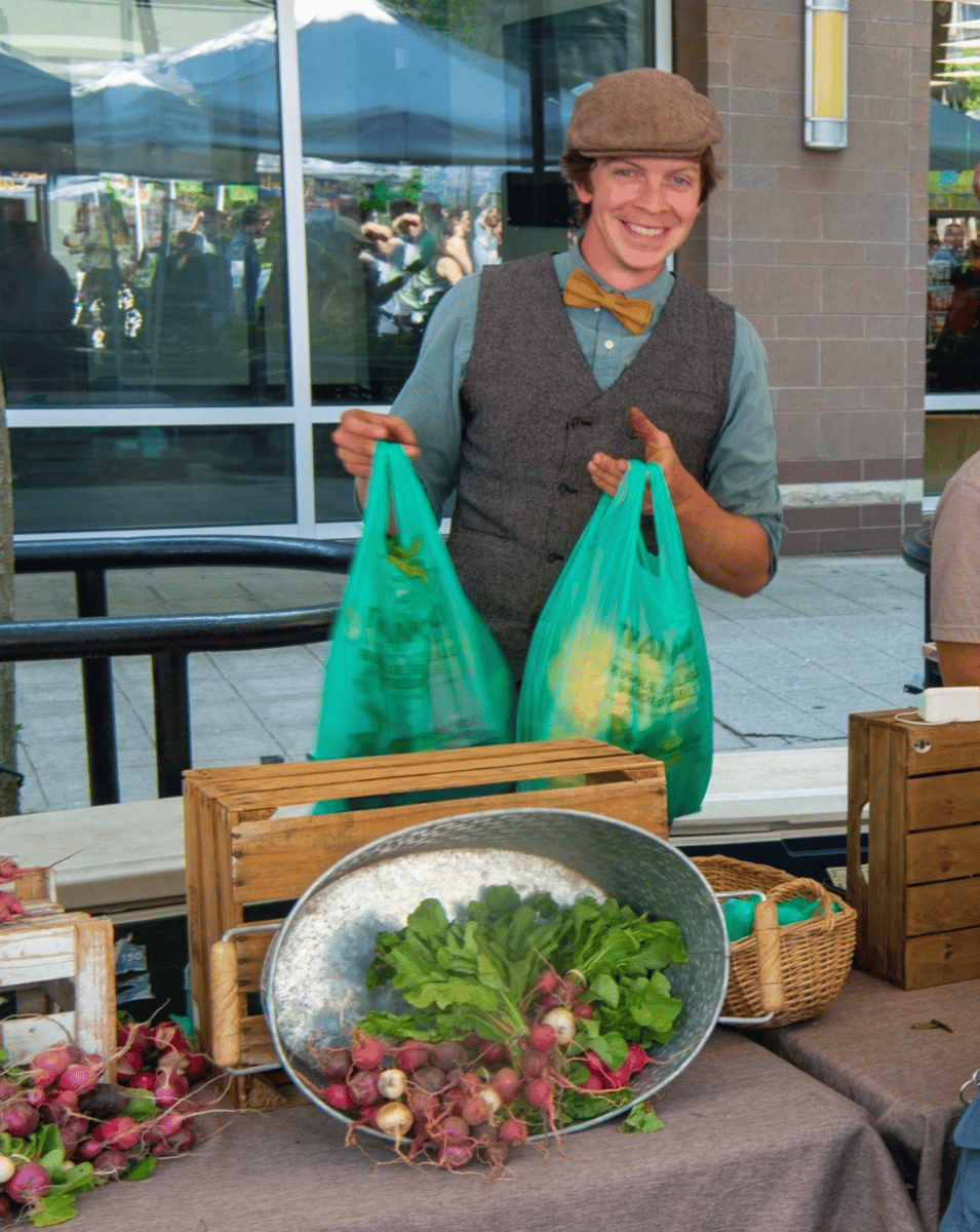 farmer with bags of food