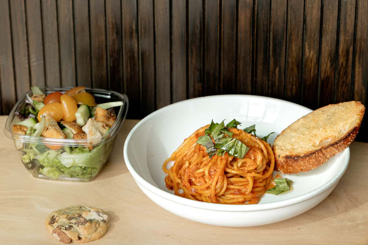 Spaghetti with bread and side salad with cookie
