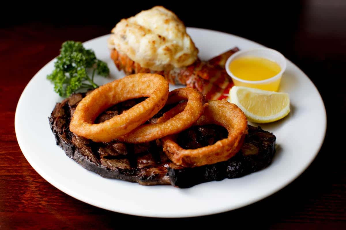Plate of onion rings and steak