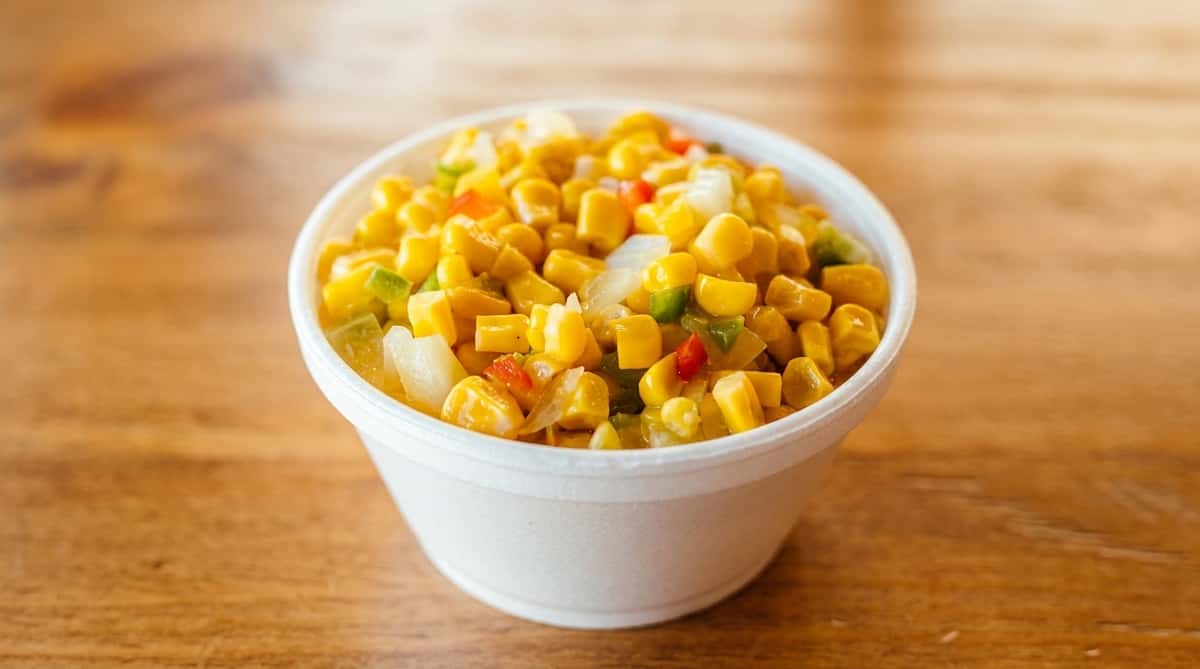 Southern-style corn side dish served at Fainmous BBQ in Pearland Texas