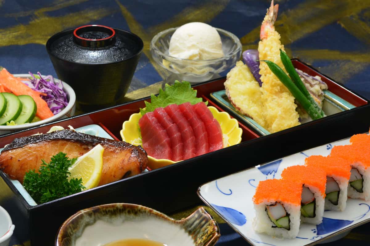 Set menu featuring our miso butterfish option. Bento features shrimp & vegetable tenpura, california sushi, ahi sashimi, salad, miso soup, and vanilla ice cream.
