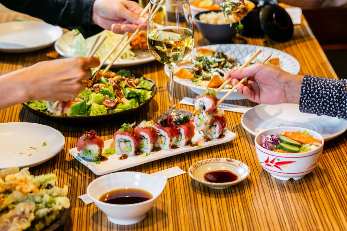 Table at Gyotaku with salad, sushi and entrees