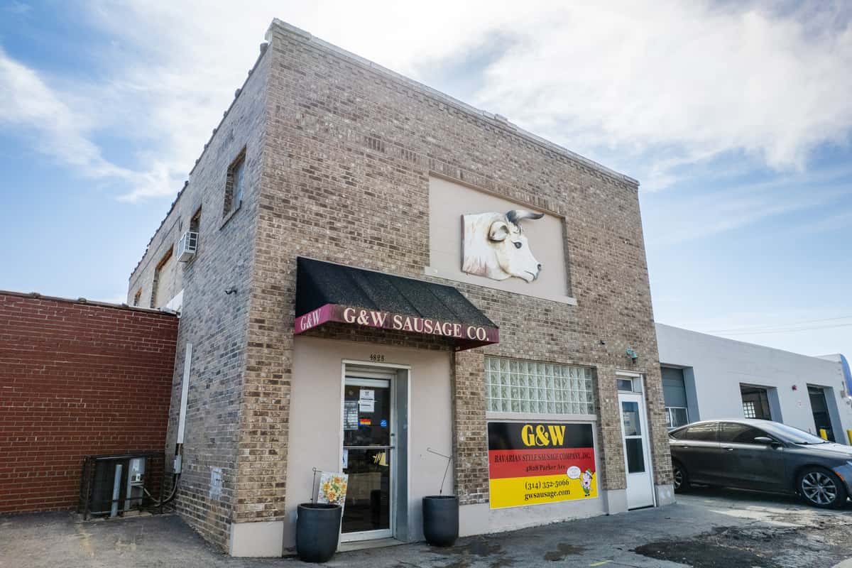 front exterior of G&W Sandwiches with bold signage and urban street setting