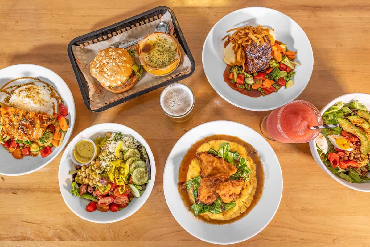 Group shot of food including salad and egg dishes