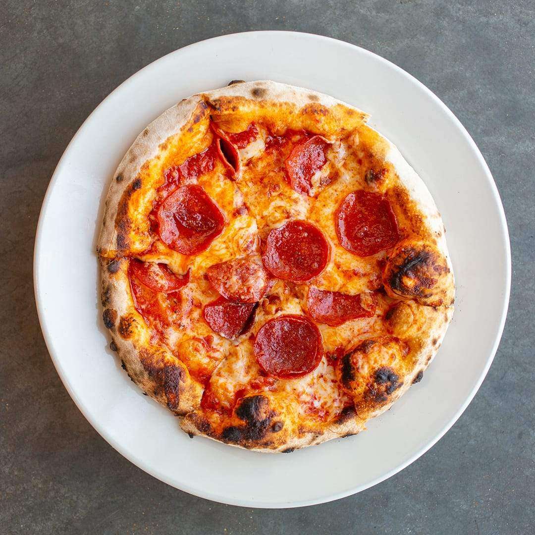 Pepperoni Pizza: Why Is Pepperoni Put On Pizzas? - Arvada Villa