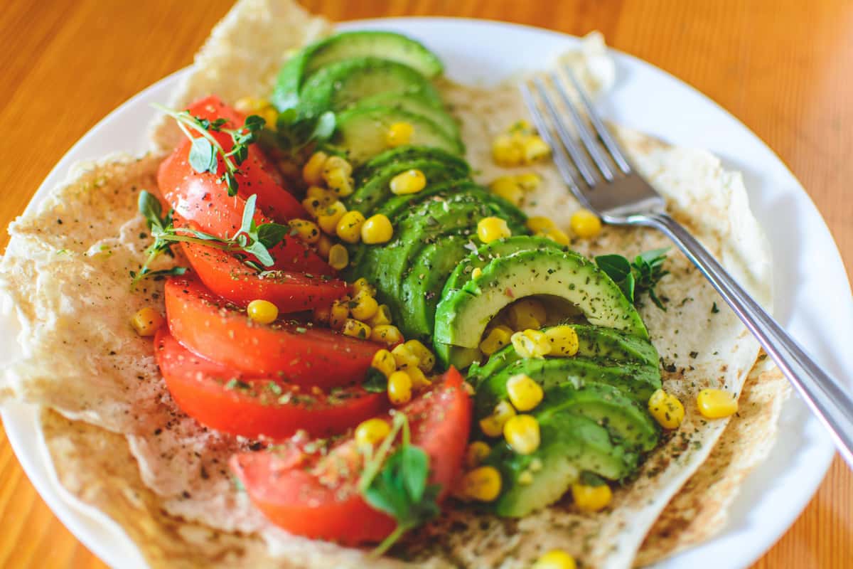 avocado, corn, tomato wrap