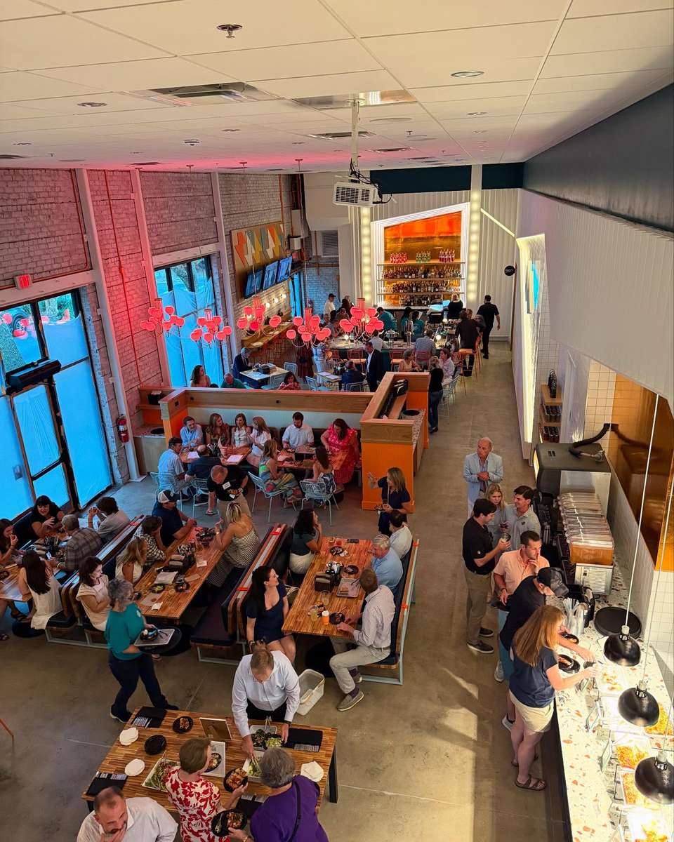 A full dining room of guests at Electric Dough Pizza Co. in the historic San Marco Theatre.