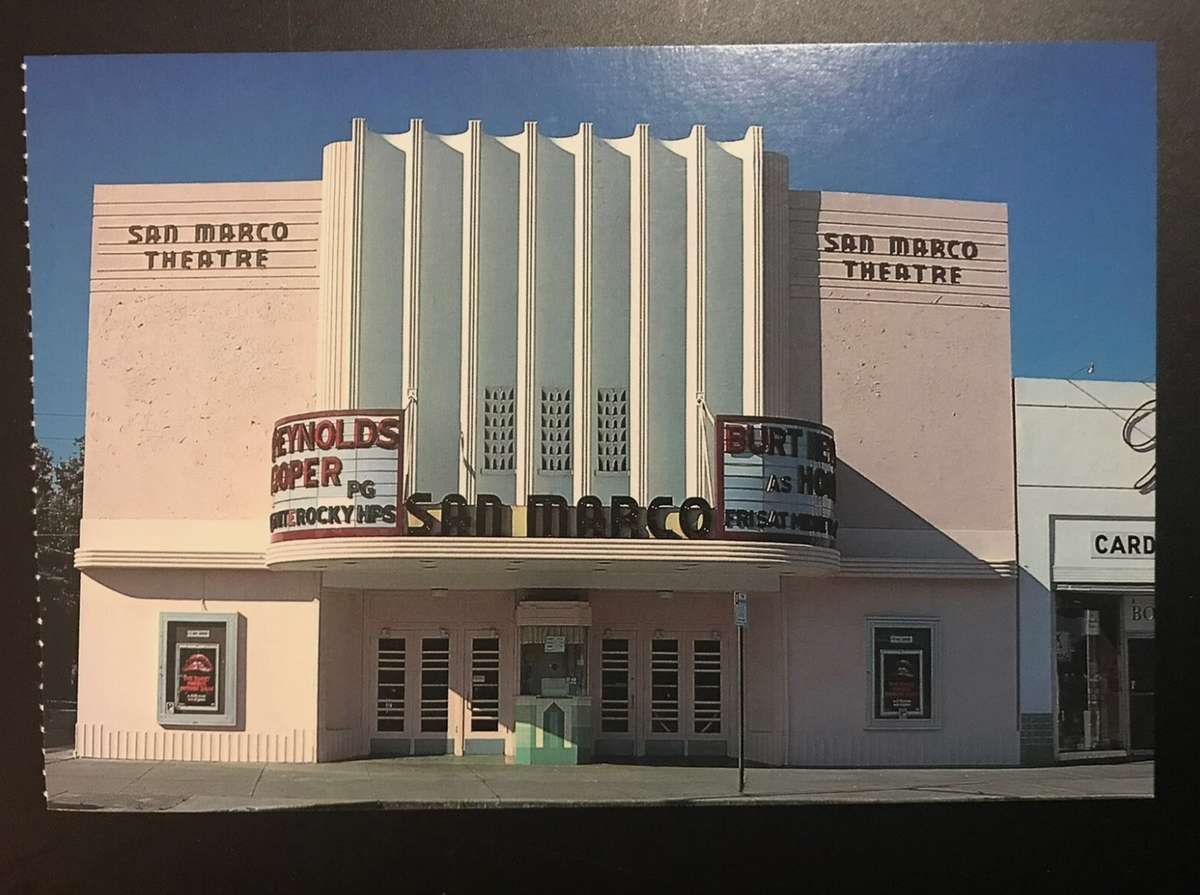 Color postcard of the San Marco Theatre facade, with its fluted tower and marquee