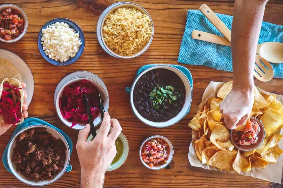 Table with bowls of toppings