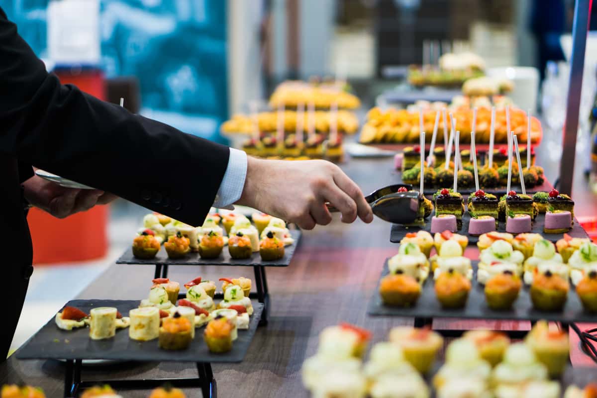 Man taking a canape