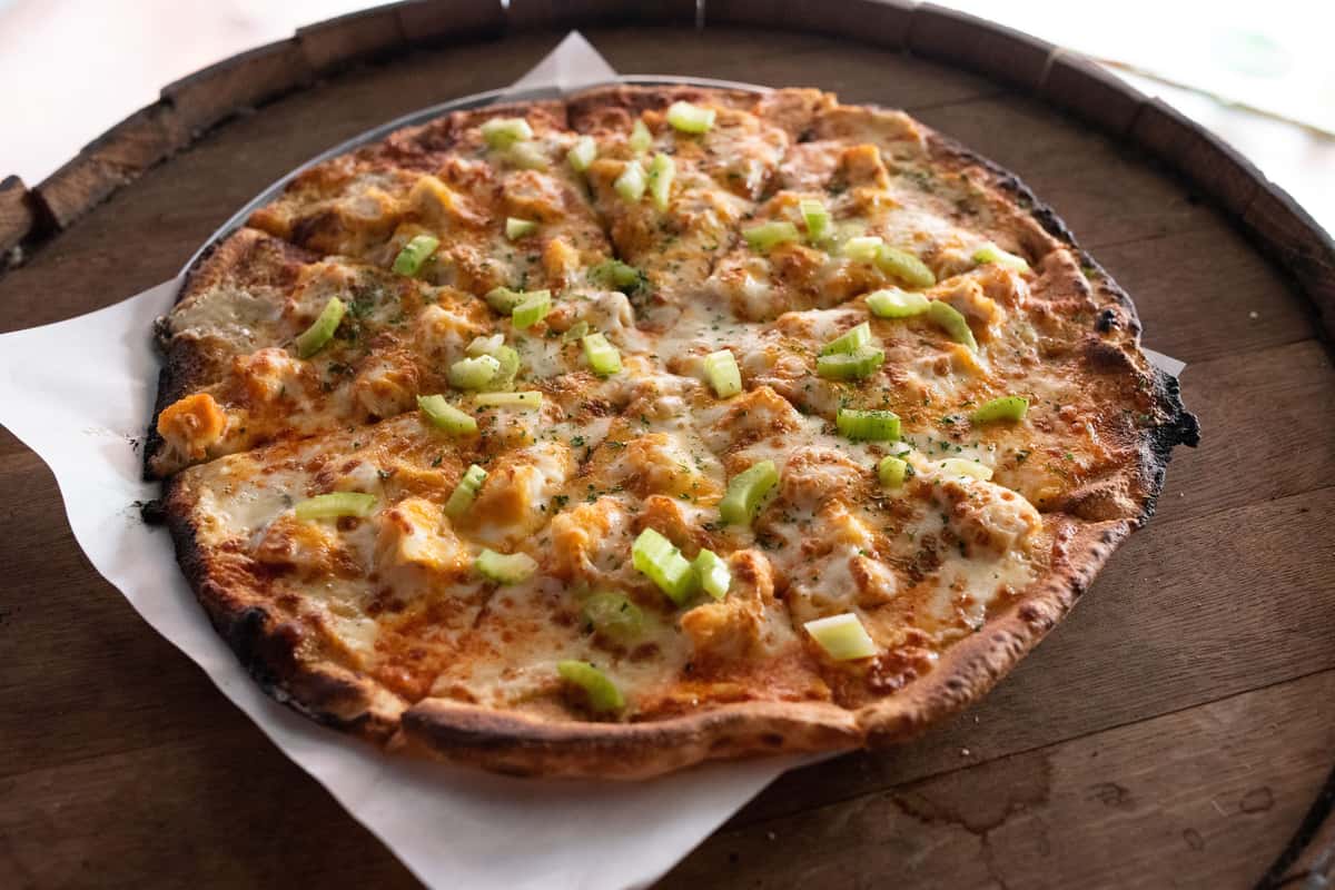 buffalo sauce, ranch, crispy chicken, cheddar, bleu cheese, house cheese