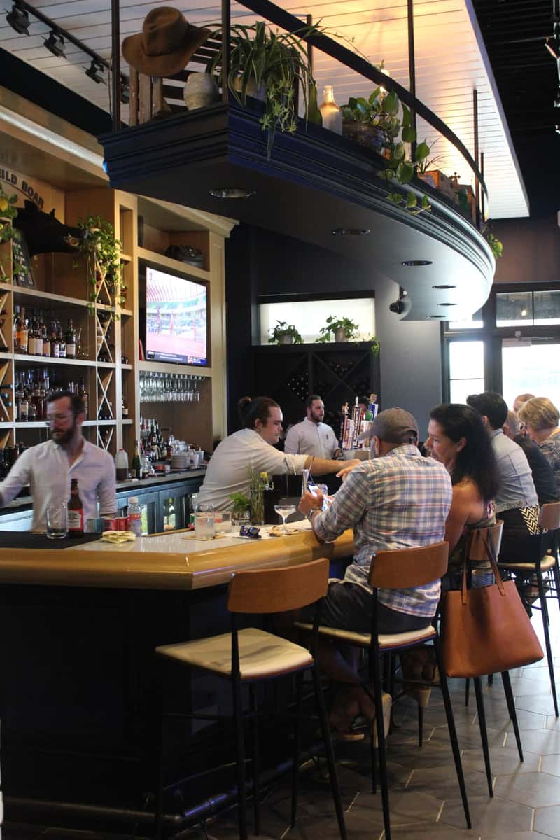 Diners sitting at the bar