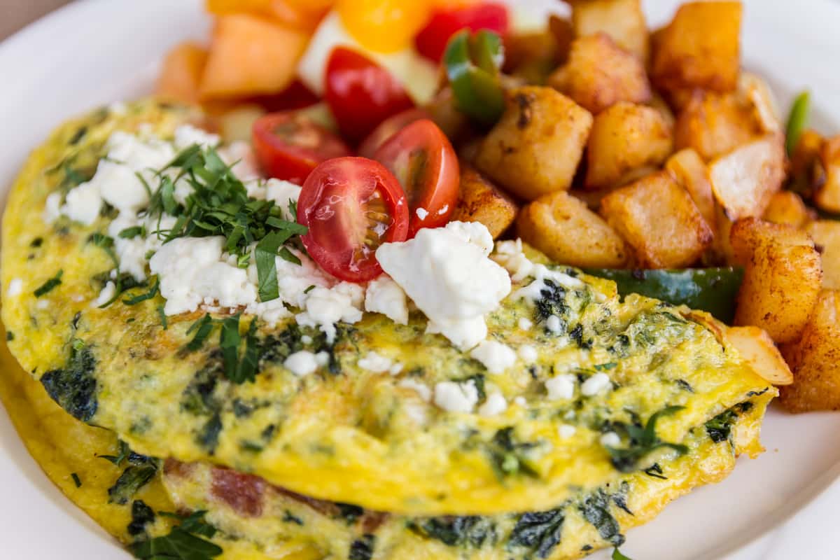 Greek Omelet with a side of potatoes