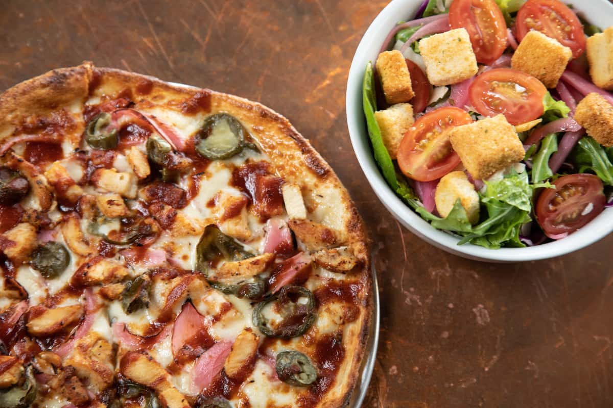 whiskey bbq chicken pizza and a side salad