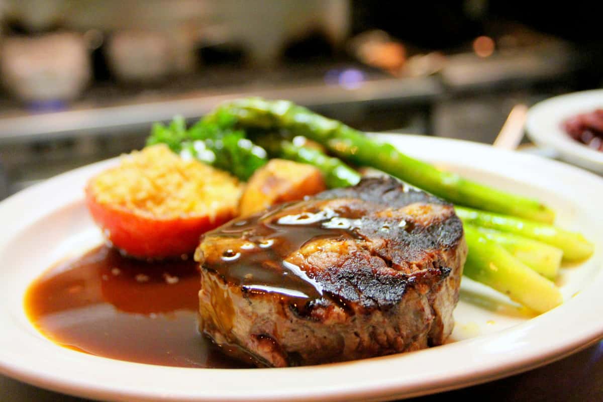 steak and veggies with sauce