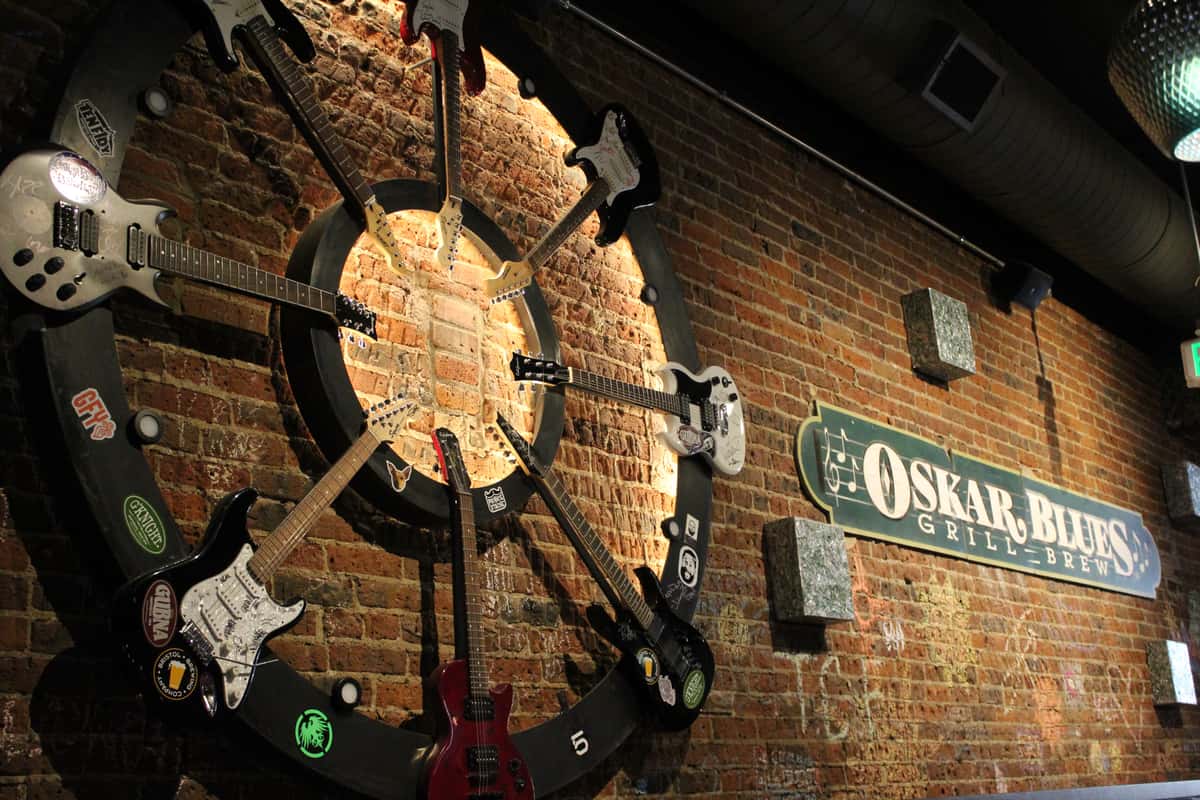 wall art made from vintage electric guitars