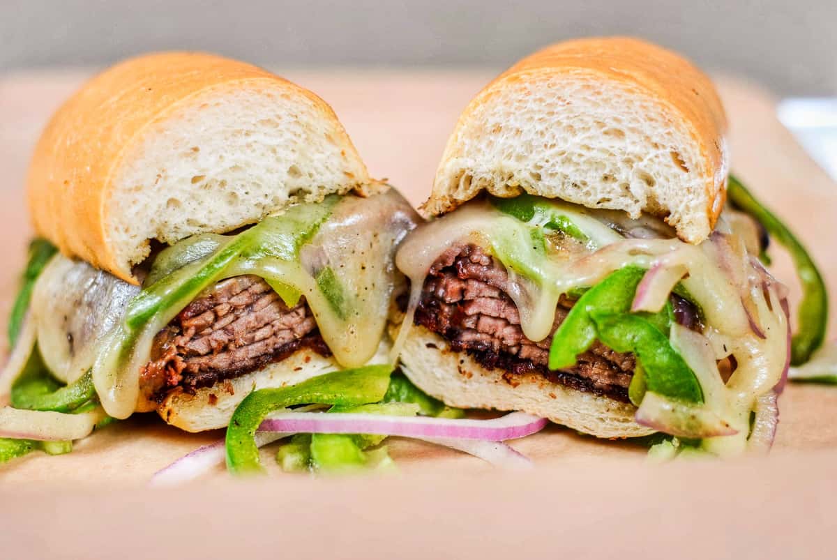 Toasted Pyrenees roll, thin sliced BBQ Tri Tip, provolone cheese, caramelized bell peppers and onions