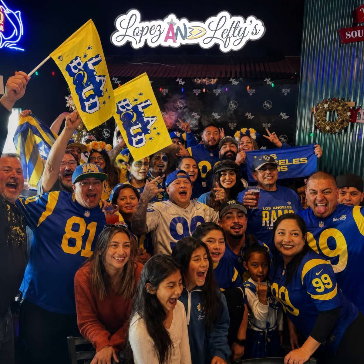 Rams crowd cheering inside of the bar