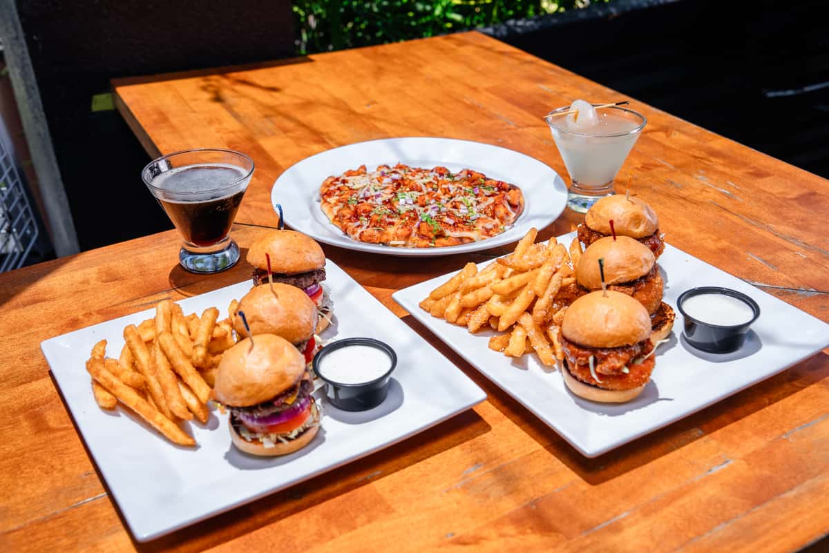 Photo of sliders, flatbreads, and espresso martini and lychee martini