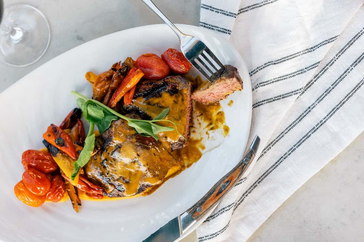 Steak on a plate with veggies