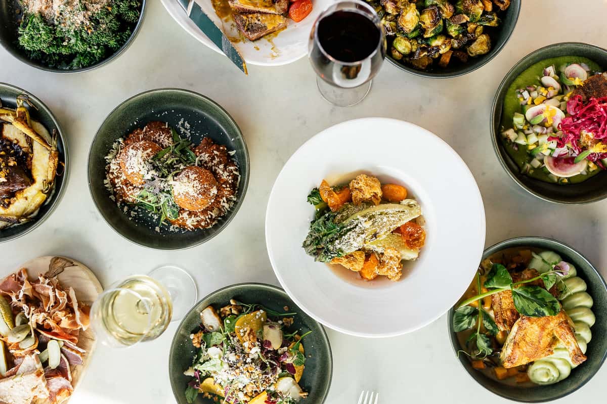 Table spread full of a variety of dishes