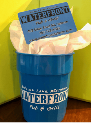 Waterfront giftcard in a Waterfront cup
