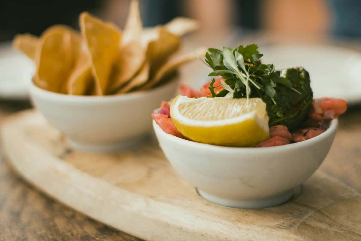 Shrimp guacamole with lemon and fresh herbs