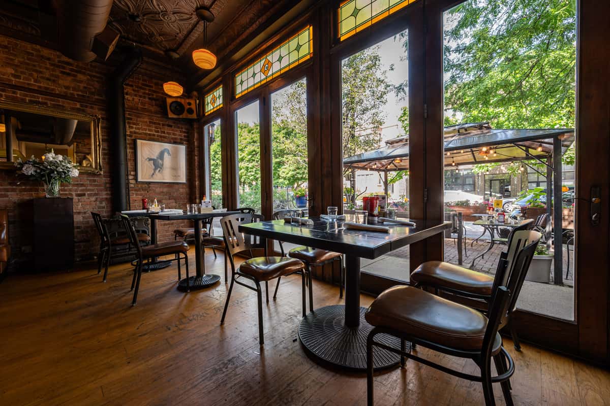 Main dining room looking out on the patio seating