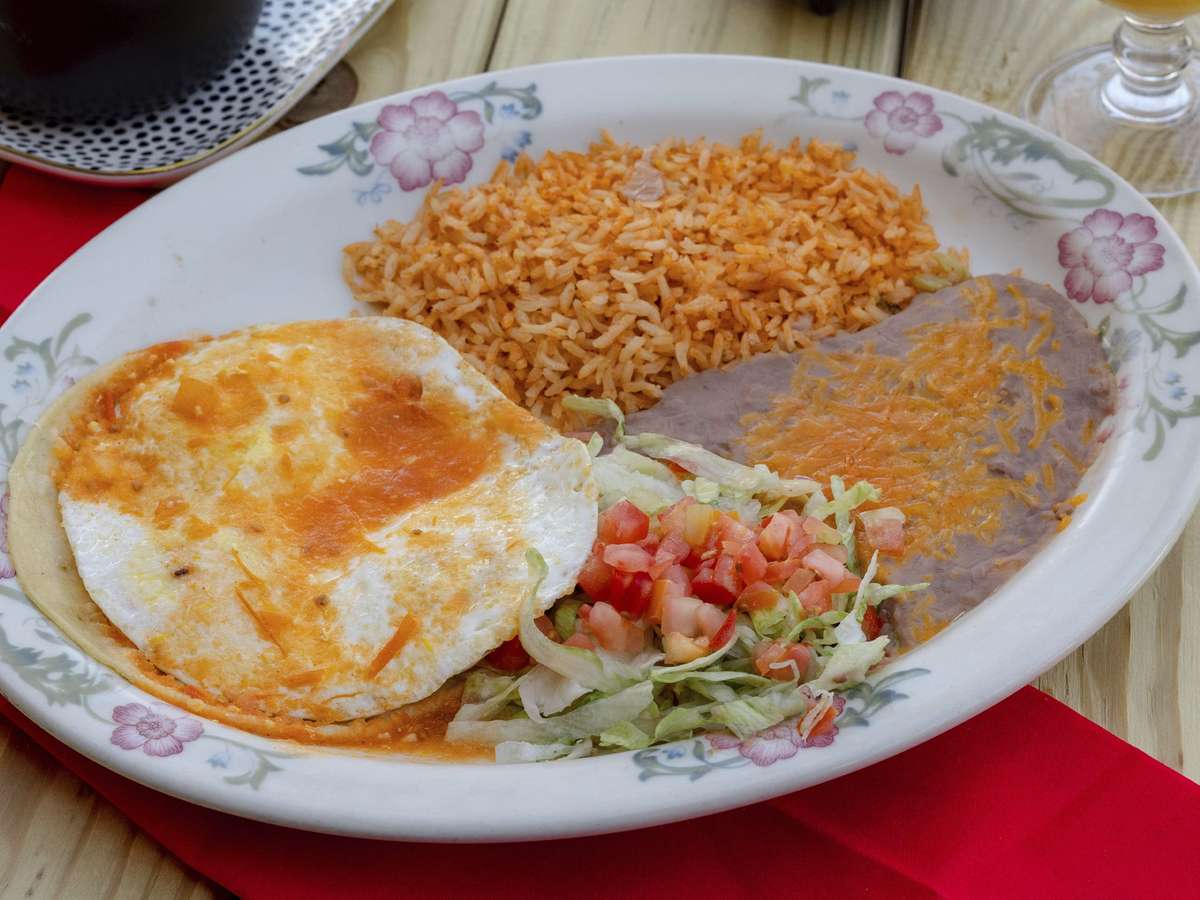 dish with rice and refried beans