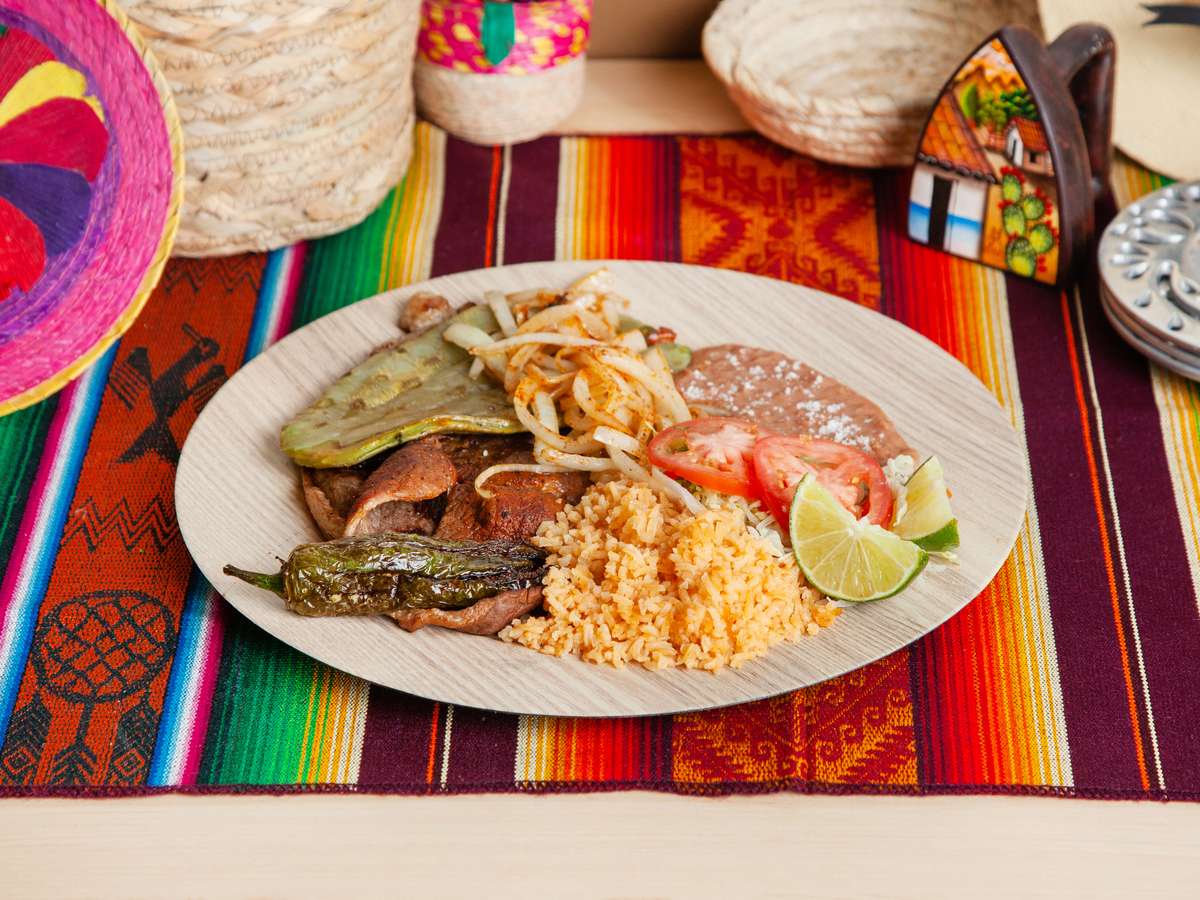 Carne asada with grilled nopales, rice, and beans at Arroyo's Grill Mexican restaurant in Atascadero