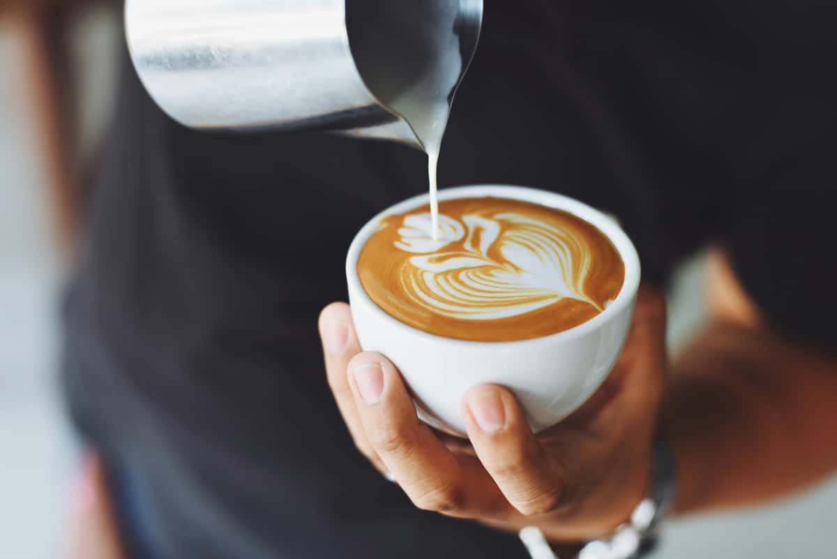 barista making coffee
