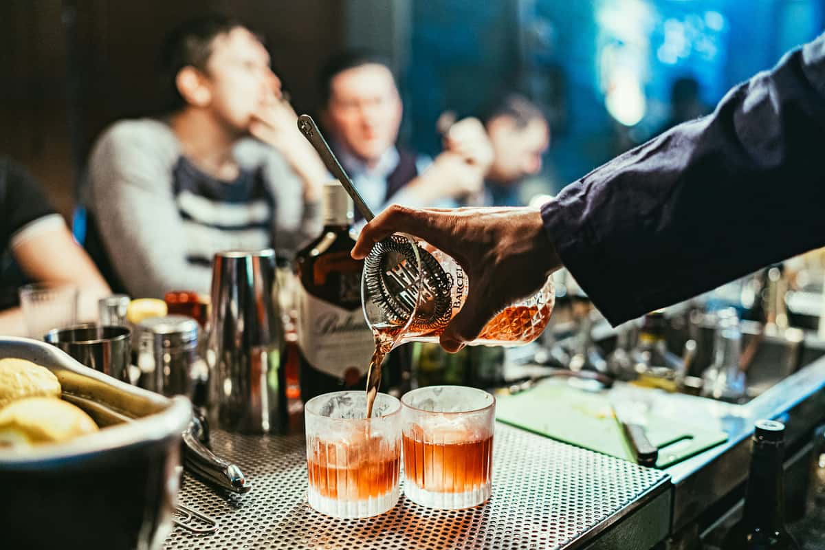 Bartender pouring drinks