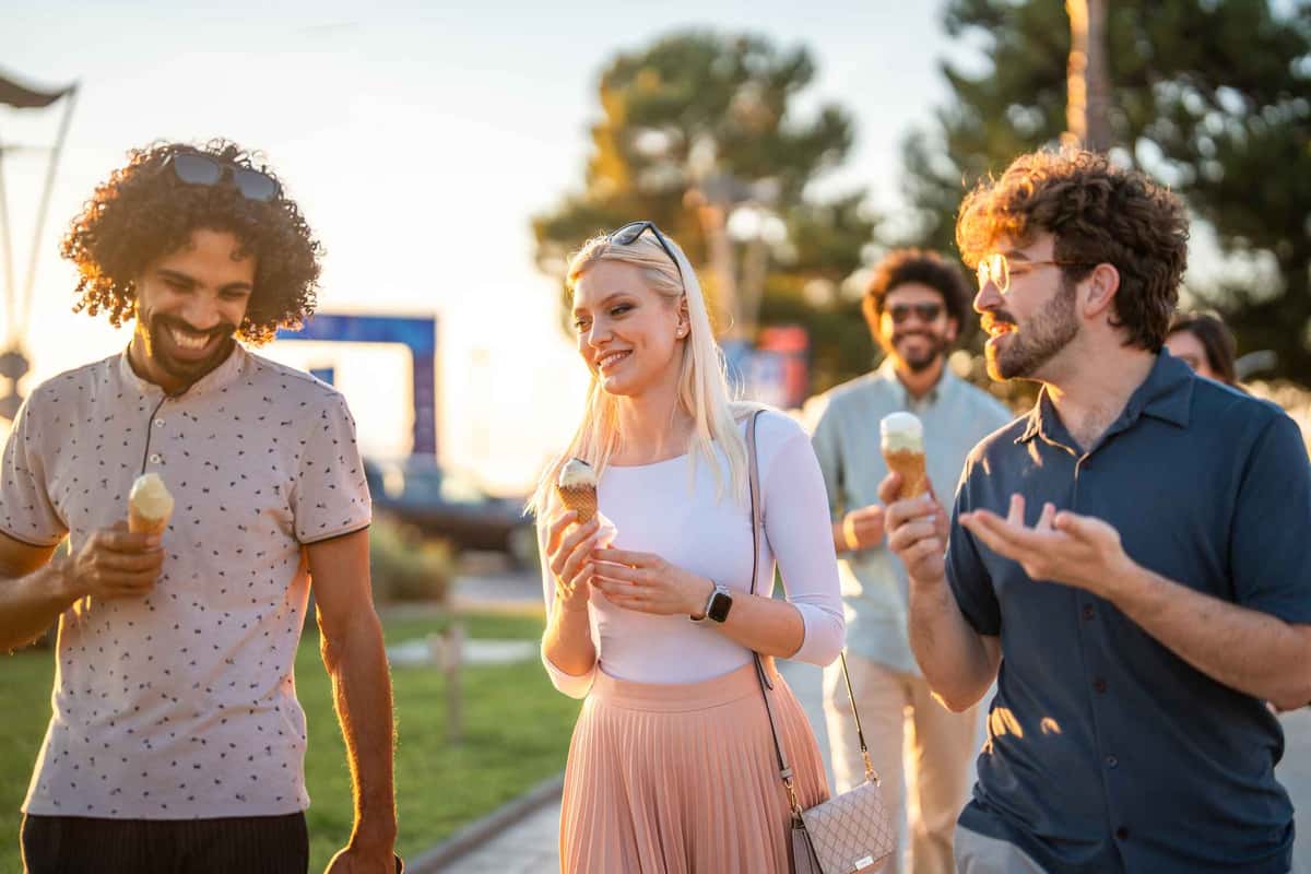several people holding ice cream 